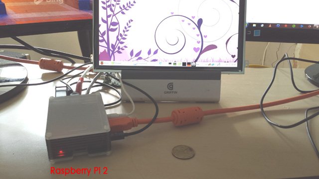 Raspberry Pi 2 – Loonie in foreground for size comparison