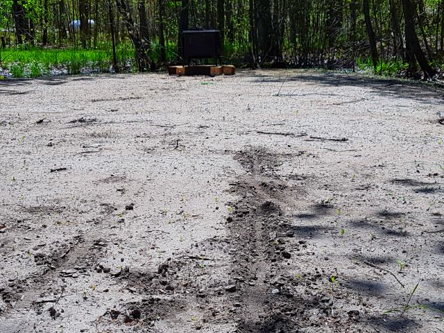 The path of destruction and the stove in the background